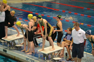 Moreno prepares to dive in at the Southwest District meet. She practices with the Cincinnati Marlins rather than the high school. Her main event is the 50 yard freestyle.    (Photo courtesy of Jean Wu)