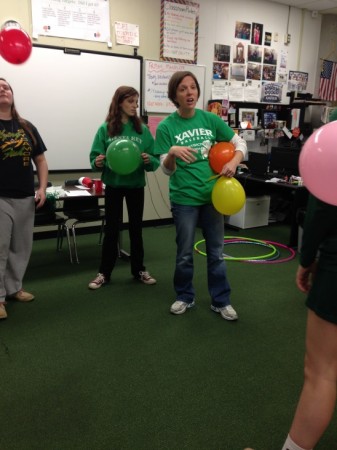 When the class has some down time, instead of watching a movie they play games with a bigger meaning behind them. ”I am not going to tell you why we are doing these things, but everyone take off their shoes," said Mrs. Googins as the class started this day of fun. The class played keep the balloon up and also was blindfolded and had to find their shoes. The point of the games were to display that teachers cannot take on everything and need to delegate to be efficient. 