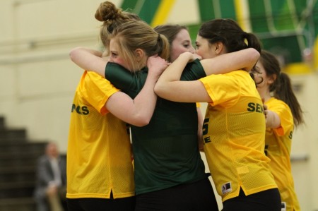  Lindsay Altemuehle, 9, hugging the seniors after their performance. The underclassmen are now getting ready for tryouts in a couple weeks. The girls are hanging up posters around SHS and making a video about the team. Photo courtesy of McDaniel’s Photography.