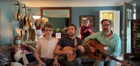 FAMILY FUN. During quarantine the Taylors have not let up on their musical endeavors, singing originals and covers as Mason Taylor strums his mandolin, Chris Taylor plucking his guitar in the back. Recently, one of their parody videos, titled “COVID-19” won an online talent competition, the family recieving a $10,000 prize. “We hope we made you smile!” said JJ Taylor, mom to freshman Maxwell Taylor.