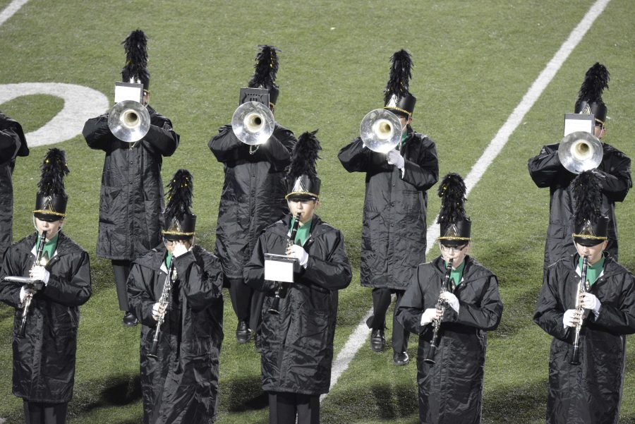 Performing at full strength at Senior Band Night The clarinets and trumpets,they played their show Film Noir .  The Marching Band now comes to a close.                                                                                                                     
Photo Courtesy Fred Peck 
