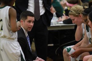 Discussing strategies in the huddle, Derek Christerson has recently been appointed the new girls Varsity basketball head coach. Many of the players pictured volunteered with the middle school kids, and will continue to work toward the start of the season. The team's first game is in November against Ursuline.