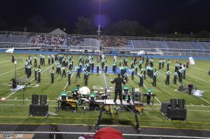 Marching band plays with full force at the Hamilton football game 2013. The marching band performs at all the home half time football games. Recently at Band Night the Marching Band played music with grades 6-8. Photo courtesy of Josh Peck.