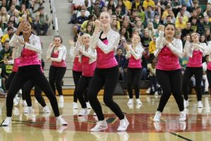The Flyerettes will be performing the same routine they did at the fall pep rally. They are excitied to show off all their hard work this weekend at UC. The team will be working hard till then to make sure the dance is perfect. Photo courtesy of McDaniels Photography. 