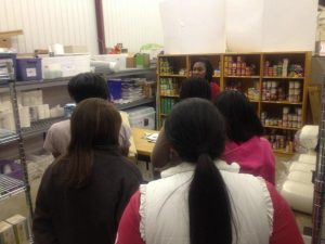 During a building tour, members of the Young Women’s Scholars (YWS) group viewed the storage area in OGB. The Holiday store will focus on replenishing the orgination’s food and clothing stock to be distributed to families in need. Volunteering at OGB is a great way to get volunteer hours while making an impact in our community. Photo Courtesy of Lauren Saxon.