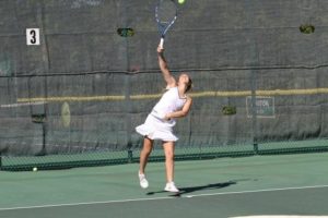 In addition to the multiple offseason exercising, players will also participate in serving practice. The serve is a crucial part of the game. Improving the serve will automatically improve the player’s skill. Photo courtesy of McDaniel’s Photography. 