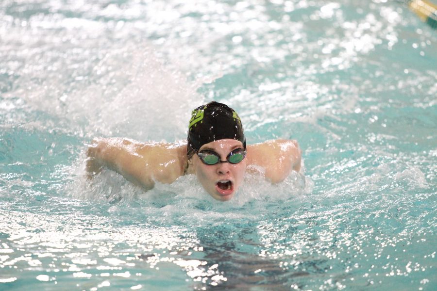 Cara Norris, 11 swims the 100 yard butterfly. Norris competed at the classic meet. She made it to finals in every event that she swam. 