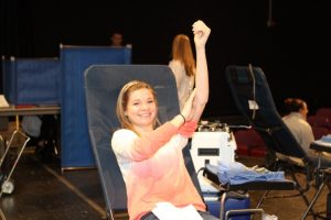 Paige Domhoff¸12 just finished donating blood to Hoxworth. The decision for SHS to host the blood drive has helped to keep the hospitals blood supply in good stock saving many lives.  Photo courtesy of McDaniel's Photography