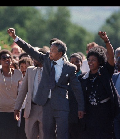 Mr. Mandela and seven others are convicted and sentenced to life in prison. In this picture Nelson Mandela and his then-wife Winnie raise their fists to the cheering crowd upon Mandela's release from the prison. He was 71 when freed. Photo Credits: MCT Photo 