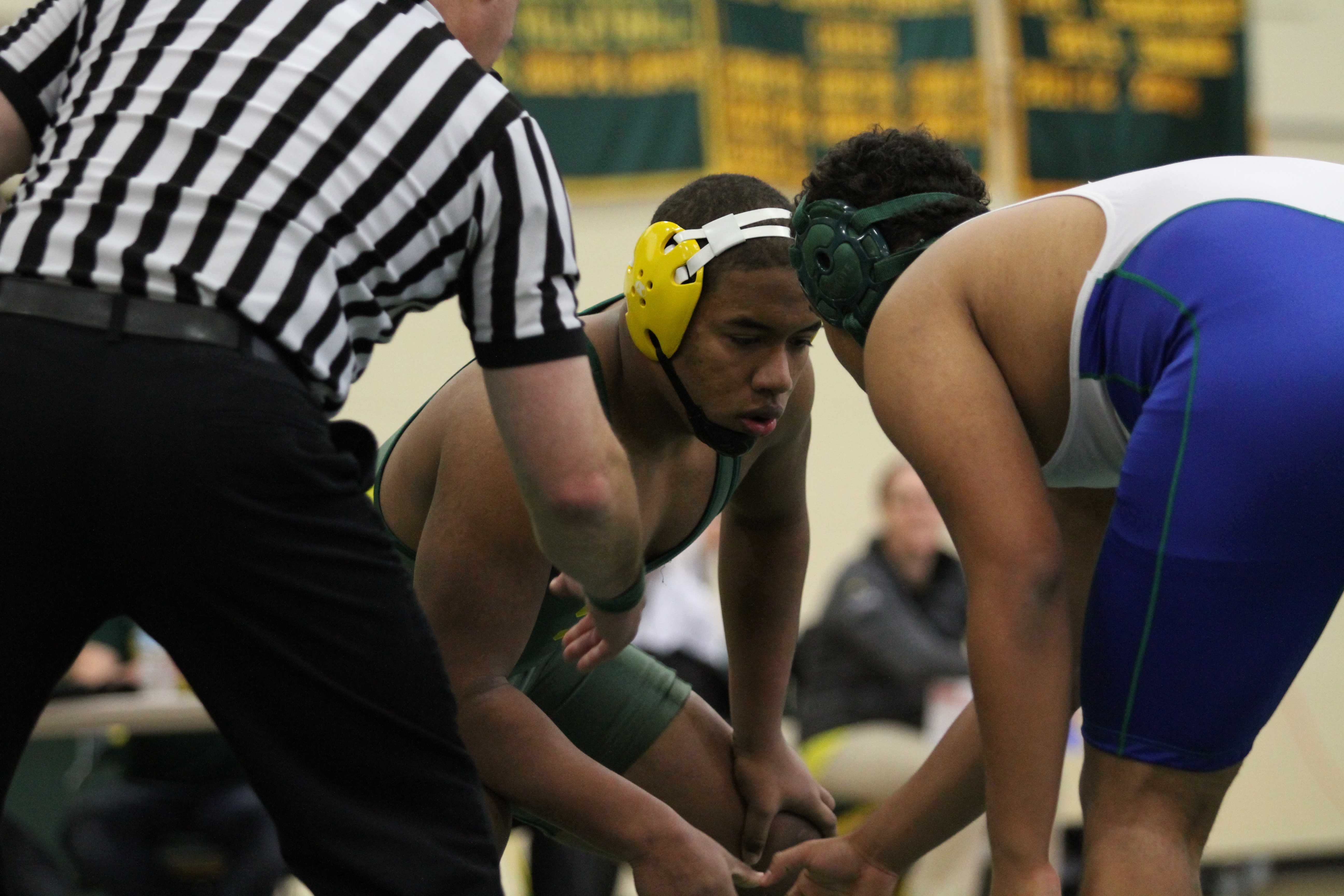 Varsity wrestling grappling opponents