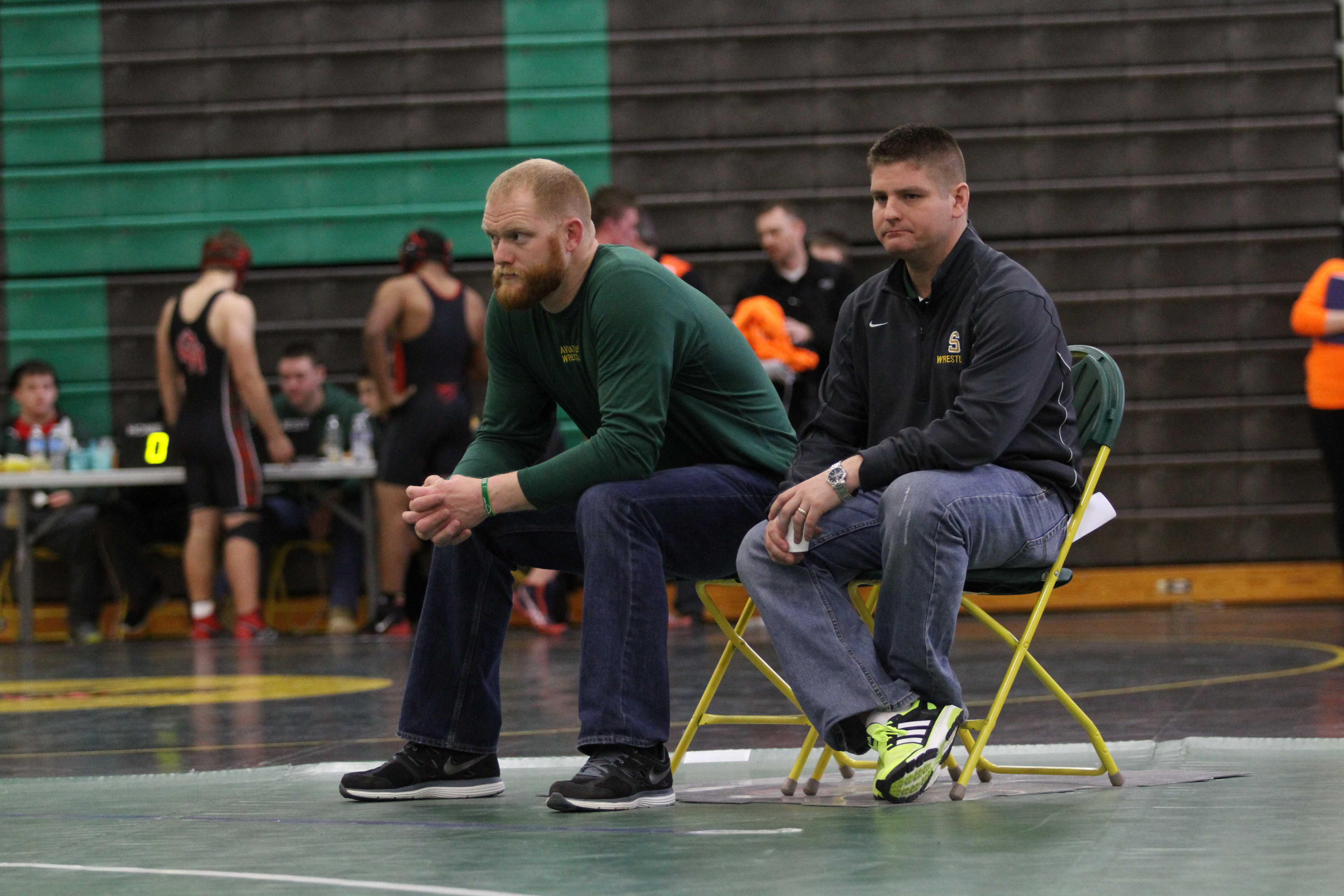 Varsity wrestling grappling opponents