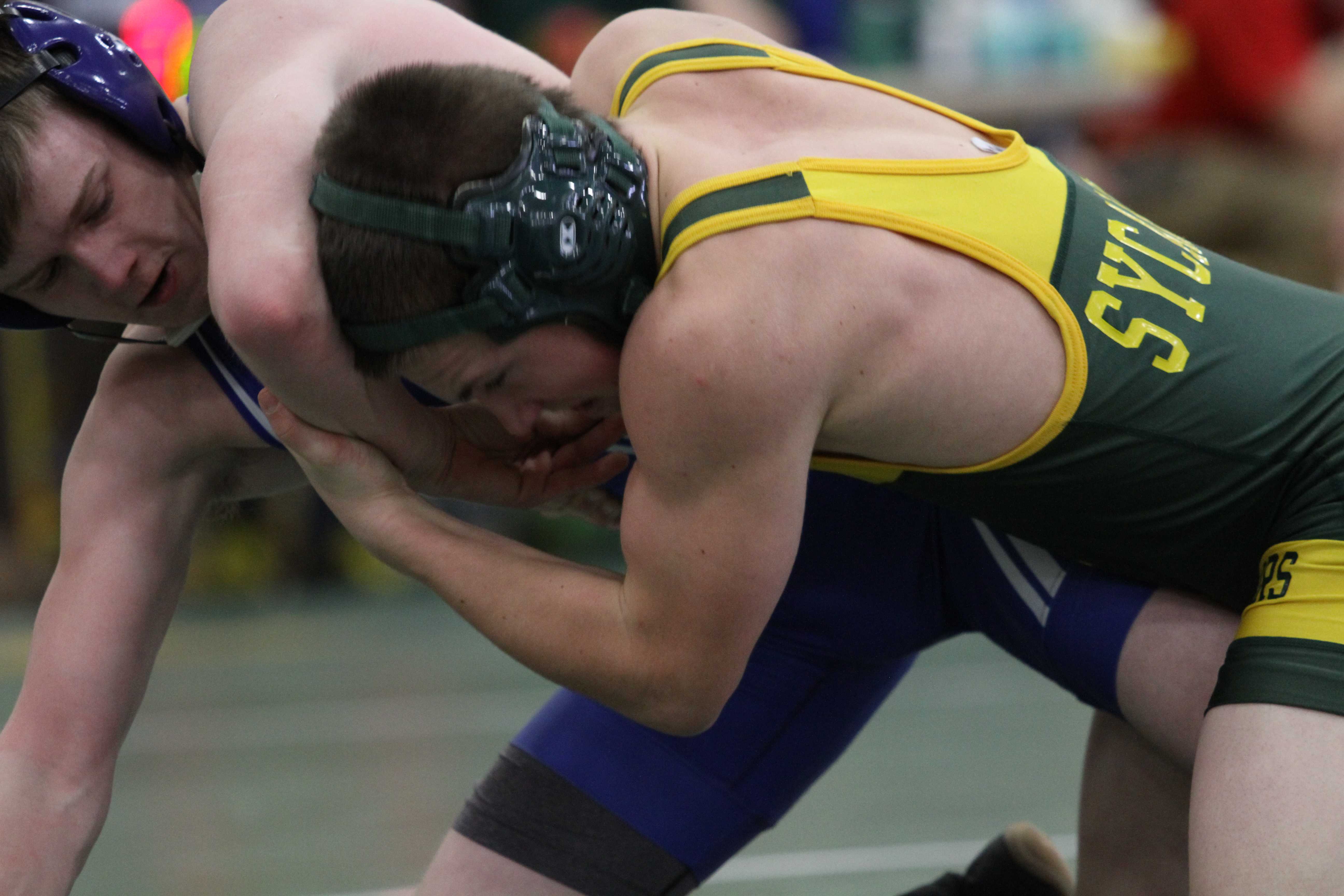 Varsity wrestling grappling opponents