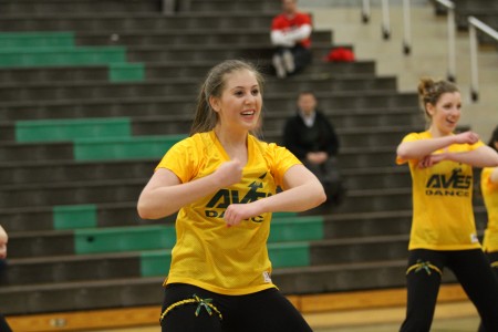 Samantha Weiss, 12 is performing during Senior Night. Sam was part of Inter Act Club for 3 years. She enjoyed volunteering with the school but was overwhelmed by the large number of members. Photo courtesy of McDaniel's Photography.    