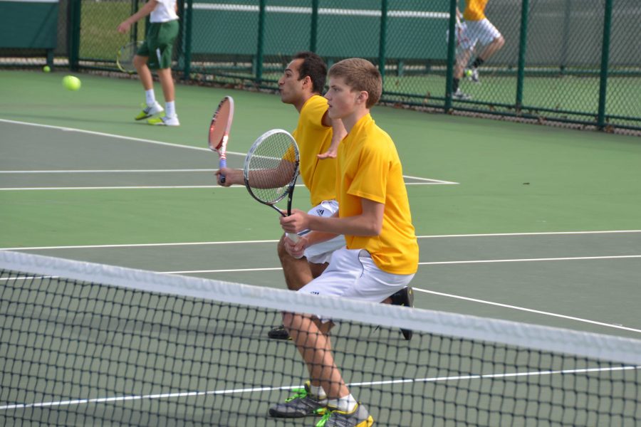 The doubles team of Mustafa Ahmad, 12, and Noah Stern, 9 played a large part in the team’s victories over Mason and Upper Arlington. Here, Ahmad lunges for a volley. The team will take on Centerville in the first round of the State tournament. Photo courtesy of Fred Peck Photography. 