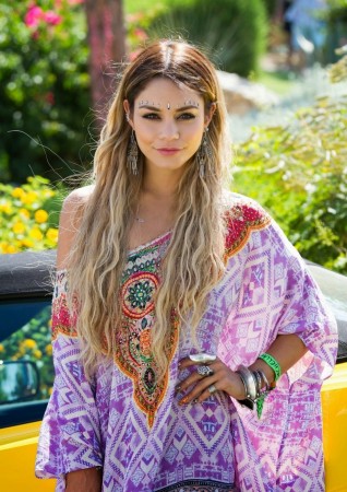Vanessa Hudgens is often called the “queen” of Coachella because of her annual appearances and boho style. Her outfits range from studded crop tops to floral maxi skirts. In the picture to the right, her colorful dress balances her chunky accessories perfectly. Photo Courtesy: MCT Photo 