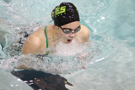 Wu is swimming to 100 yard breaststroke. She will be competing in relays at the State meet. She did not qualify in her individual events for States.  (Photo courtesy of McDaniel’s Photography) 