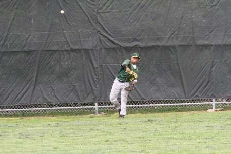 Greg Simpson, 12, throws a ball from just short of the wall. Simpson lead the team in batting average this season. He was not only a baseball star, but a football star, being the starting quarterback for varsity. Photo Credit: McDaniel’s Photography 