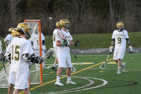 Lacrosse is a game focused on strength and toughness. Coach Kevin Hess focused heavily on the physical ability of the players over the off season. The Varsity team has experienced some major setbacks, however, losing two senior leaders to devastating injuries. Photo courtesy of McDaniel’s Photography.