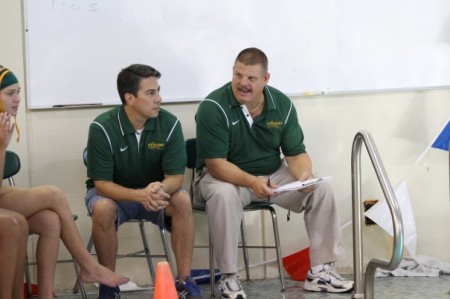 Coaches AJ Sofio and Gary Tameris instruct their players on the game. Next year both Tameris and Sofio will coach the team again. They are currently both coaching the local club team Moose water polo. (Photo courtesy of McDaniel’s Photography)