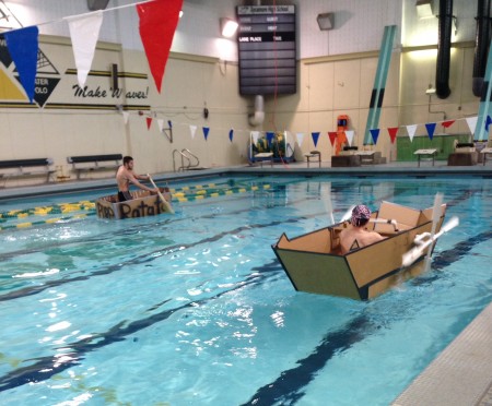 Separate bells held separate boat races, which were well attended by spectators. The boats were constructed using only cardboard, duct tape, and glue. Each boat had a theme and a name. Photo courtesy of Megan Schroeder.