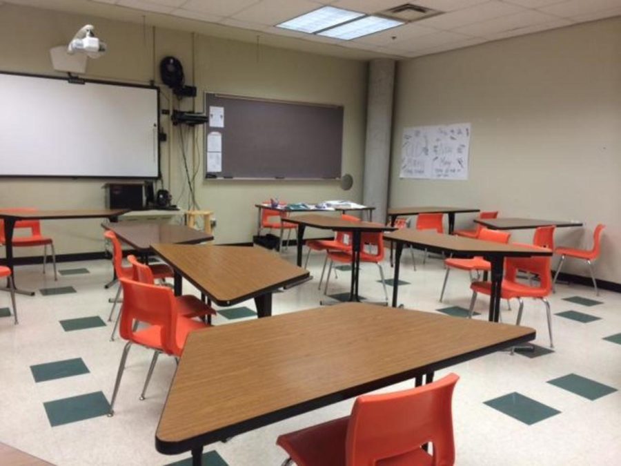 A typical classroom set up for debates.  The affirmative usually on the left side and the negative sits on the right side.  The two teams debating always face each other.  As the people debating they stand at the podium. Photo taken by Jordan Baker