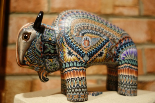 This buffalo was made by an artist who takes clay and folds it to get different shapes. Then he cuts and compresses the clay to turn them into elaborate repetitive patterns. This takes the simplicity of molding clay to a new extreme.