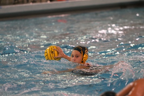 Senior Jennifer Weber looks for an open pass. Weber is a captain this year alongside junior Hannah Kast. Weber also plays for the club team Moose Water Polo and competed in the Junior Olympics in California with them this summer. 