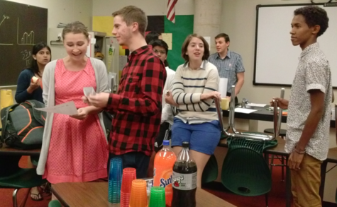 The Japanese Club opens its first meeting with a discussion between board members senior Daria Beniash and senior William Hobart. The club meets in Mr. Wesley Tootle‘s room every Monday after school to participate in Japanese culture-themed activities. Clubs cover a variety of topics, including cultures, the arts, athletics and more.