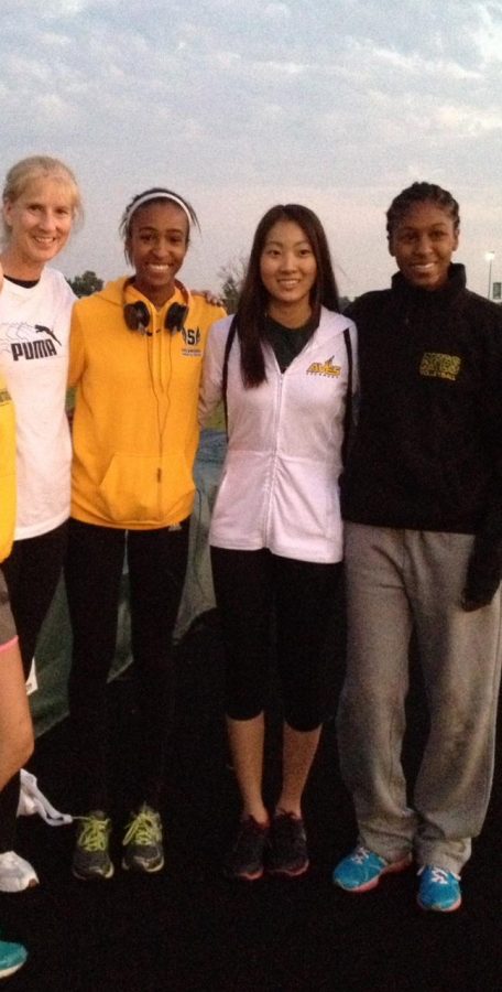 Pictured are Boyle (left) and some of the high jumpers she works with. They prepare for the upcoming winter track and field season. Sessions focus on technique. 