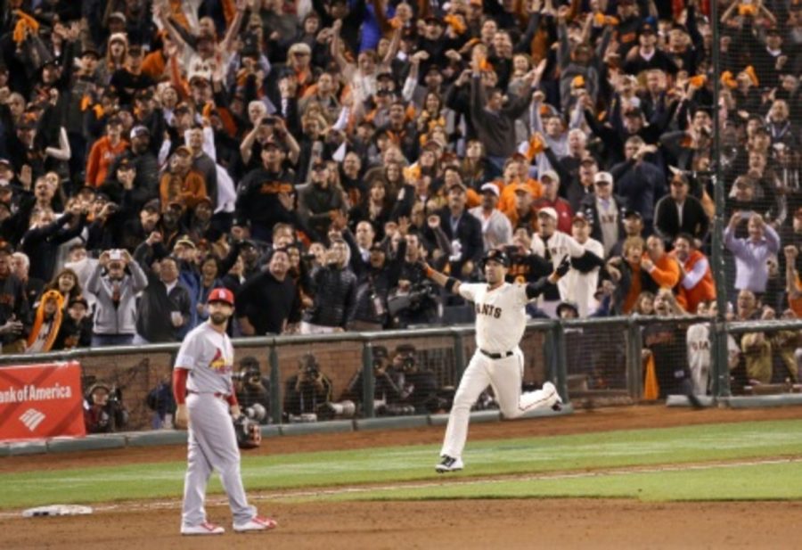 Travis Ishikawa celebrates after hitting a walk-off three-run home run to send the Giants to the World Series. The Giants have won the World Series two of the past four years (in 2010 and 2012), and are looking for their third championship in the last five years. 