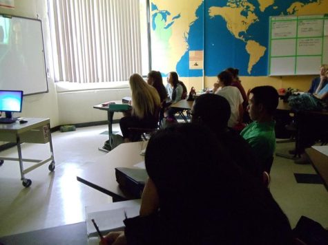 Students in Mr. Andrew Ovington’s Bell 6 Accelerated World History class watch “Amazing Grace.” They are expected to complete a worksheet that goes along with the movie. This is just one example of what happens in all types of classes around the school. 