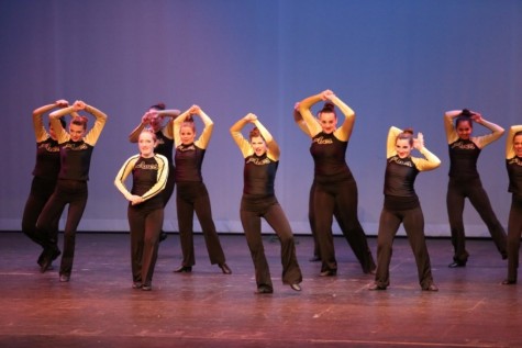 The Flyerettes are working on a hip hop routine. “Hip hop is my favorite style of dance because it is upbeat and we get to dance to popular songs,” Bird said. They danced in front of the school on Oct. 10.