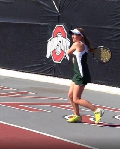 Junior Alexa Abele plays her first match in the final four of individual state. She is playing on the Ohio University tennis courts. Abele finishes a backhand cross court shot. (PHOTO CREDIT: MICHAEL TEETS)