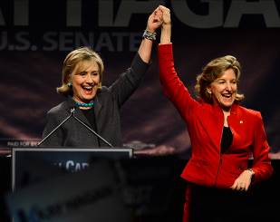 Hillary Clinton with Senator Kay Hagan following her speech at an early voter event in Charlotte. Such events promote voting while increasing visibility of female politicians. Clinton has spoken at many of these events on her national campaign circuit.