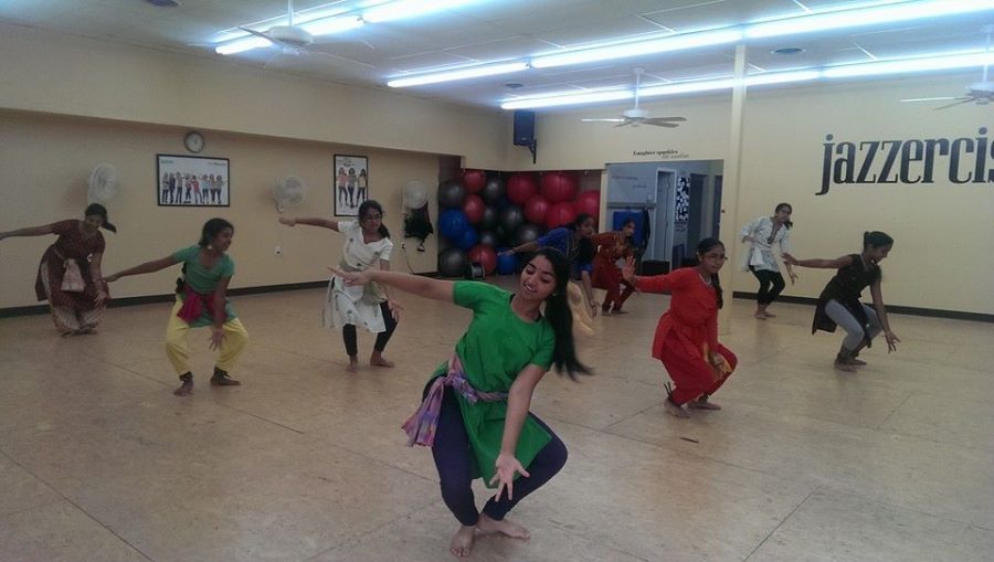 Sneha Rajagopal, 12, instructs an Indian dance class. Three times a week she teaches the class to girls ages five to 13. She enjoys watching the girls improve over time. Photo Courtesy of Sneha Rajagopal. 