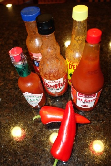 There are many types of hot sauces to spice up your food. Look at the ingredients to see what type of peppers they use to assess their heat level. Also look for other spices you might like to add more flavor to your food such as garlic or cilantro.