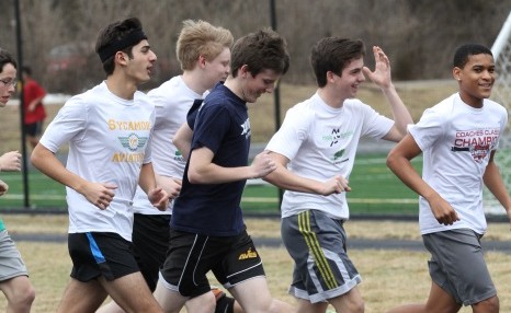 Some returning members of last year’s winter track team run a workout with friends.  Many upperclassman were eager to get back into the season for the season for the social side.  Some freshmen are also excited to try indoor track for first time. 