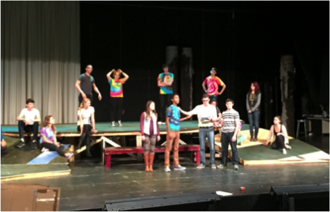 Students in Acting Ensemble rehearse a scene from The Odyssey. They utilize the newly built platforms in their portrayal of the scene. Being four weeks away from opening night, the students are now starting to run scenes off book.