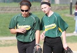 Savanna Asbroke and Love are juniors making them leaders of the team. “I am really excited about softball this year. It will be an different experience being a upper classman on the team,” junior Asbroke said. Photo by McDaniel’s Photography.