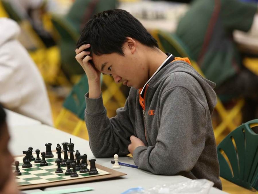Sophomore Daniel Dong concentrates on his next move. Intense concentration is required for chess. One’s opponent is not required to tell them what move they just made. Studies in China, America, and Russia have proven that chess strengthens concentration.
