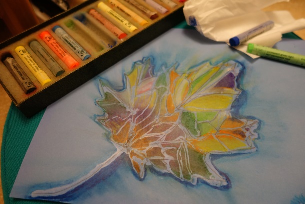 Try this easy fun piece of art.  Draw or outline a large leaf using school glue.  After the glue dries, fill each section of the leaf with different pastel colors. Spread the color using a tissue and enjoy your masterpiece.