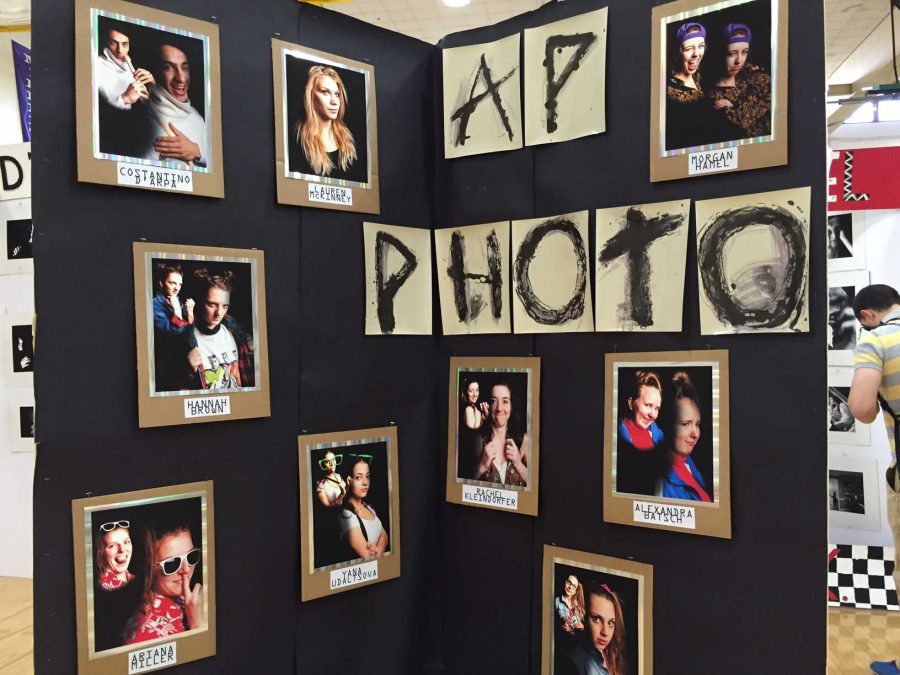 AP photography students get silly in photos displayed at the art show. Every year the seniors take awkward senior photos to display outside the photography room and at the art show. All of the seniors and many of the underclassmen have displays showcasing the work they have done throughout the year.