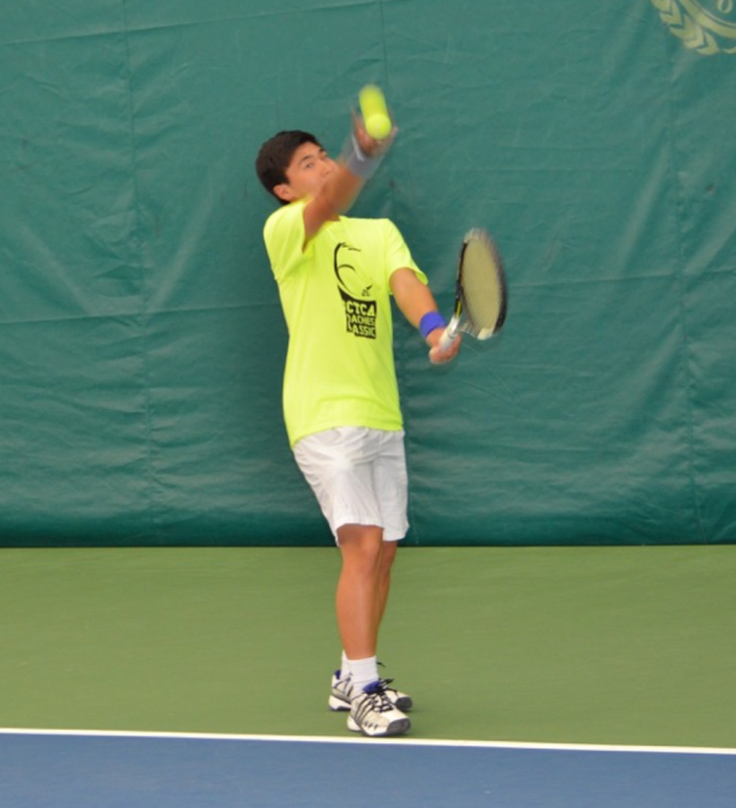 Photo courtesy of Neil Yejjey
Liou serving. His favorite shot is his serve and forehand. He considers Fernando Verdasco his favorite player.  
