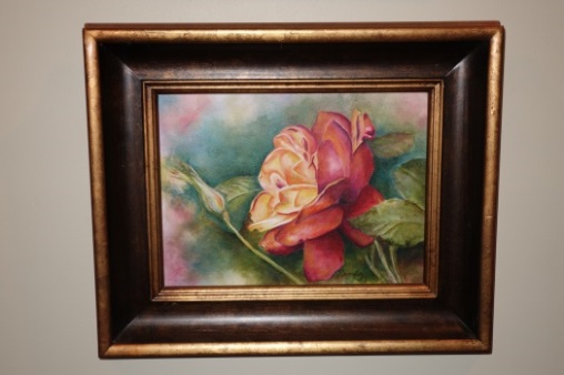 Acrylic Paintings are well known for vibrant and bright colors. This flower done by Mary Looney helps portray the wide range of colors. It also shows the evident layers from the background to the rose.