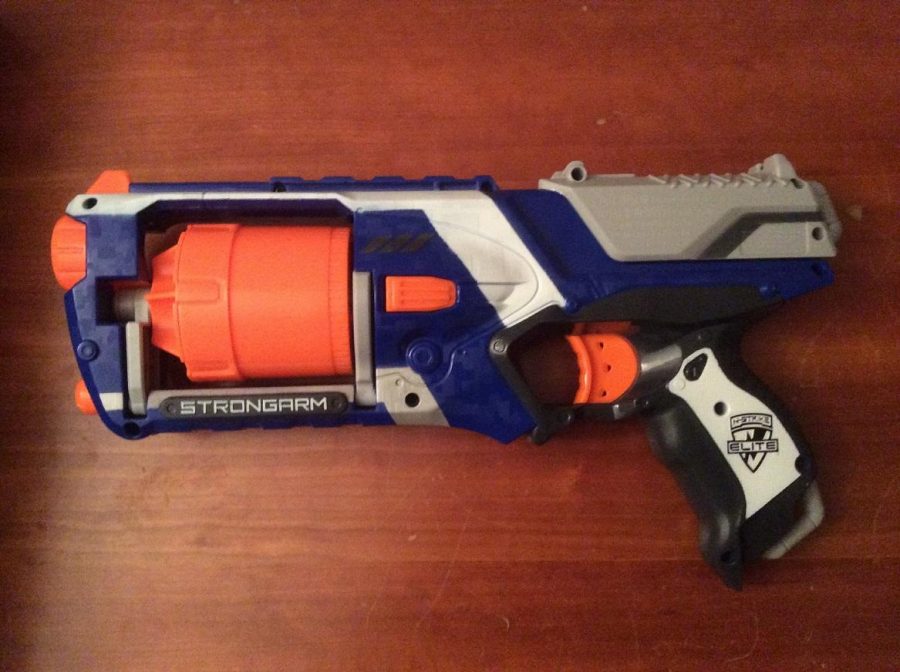 Nerf guns like the one pictured above is one of the more popular ones. It shoots soft foam darts. Players also can use PVC pipes to propel darts at their target. 