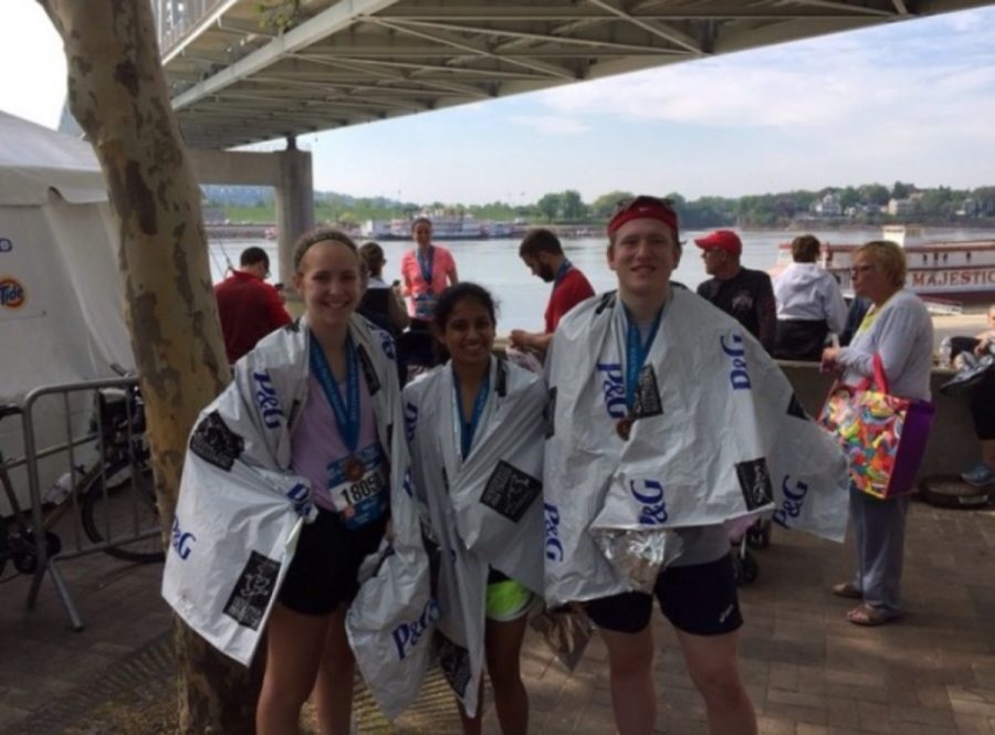 Juniors Grace Whaley, Maya Sheth, and Chris Seger immediately after completing the half marathon. The Flying Pig marathon is an annual event which occurred on May 1 to May 3. Events include the 10k, 5k, half marathon and marathon.