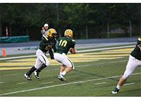 Starting quarterback Jake Borman hands off to starting running back Ra'Von Bonner. Bonner is currently second in the GMC in rushing yards.