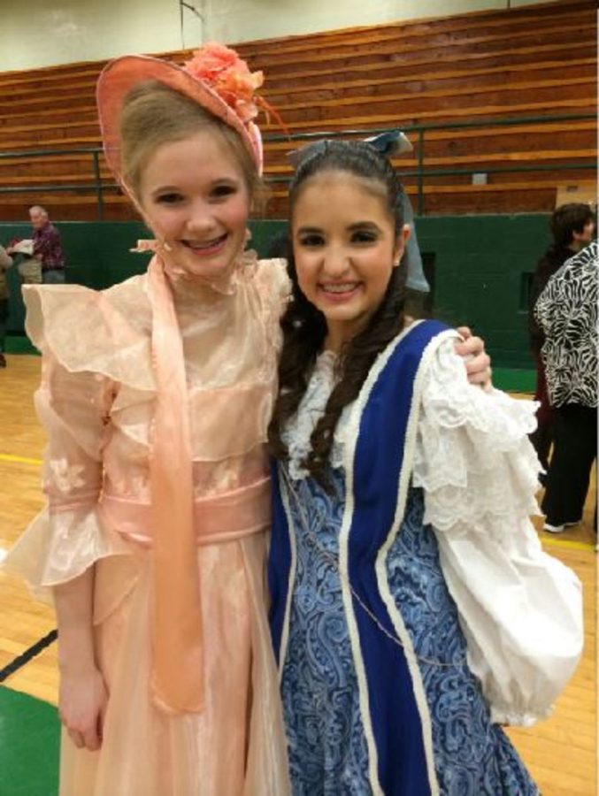 London Brinkman and Sarah Guedira are currently freshman that are actively involved in theatre. They are in costume after performing “The Music Man” last spring.