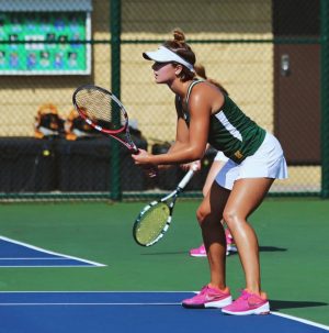 Varsity Gold members lost to Mason 2-3. Skwara and senior Alexandra Abele won their matches. A supportive crowd can make a big difference for the outcome of a match. 