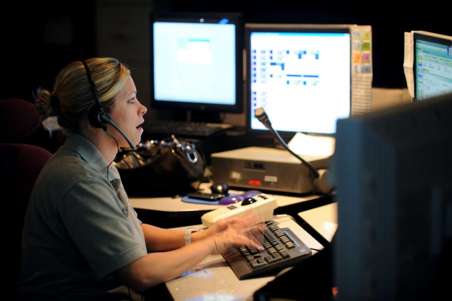 Kirsten Tucker answers a 9-1-1 call during her afternoon shift on Sept. 9, 2010 in Boynton Beach, Florida. It is required for emergency dispatchers to confirm every single call. They waste hundreds of hours per year on “accidental calls.” 